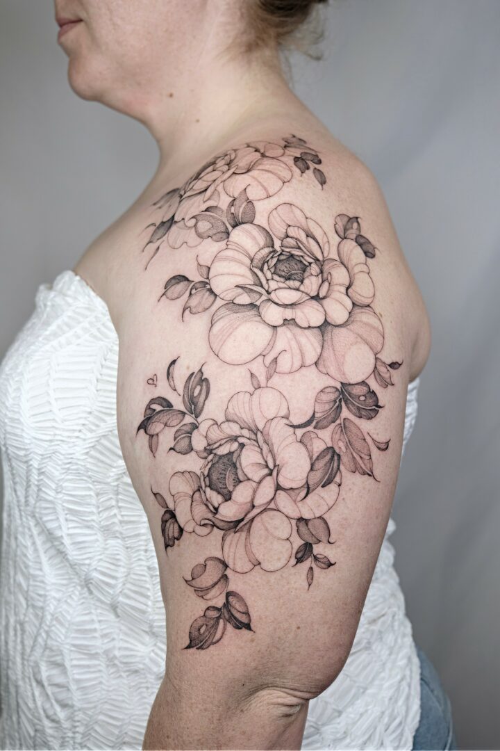 A natural composition — shoulder & upper arm tattoo by Anna Koltun